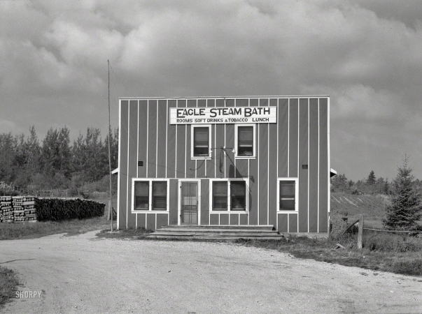 Photo showing: Club of Jacks -- August 1937. Steam baths are very popular among the lumberjacks near Craig­ville, Minnesota.