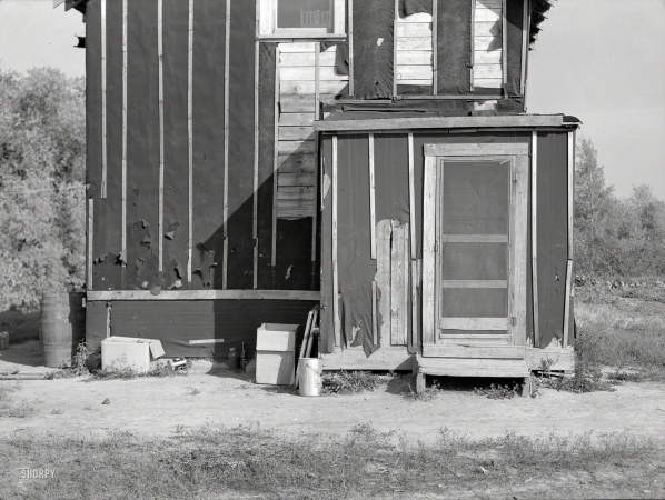 Photo showing: The Farmers Quarters -- September 1937. Koochiching County, Minnesota. Farmhouse on cut-over land near Northome.