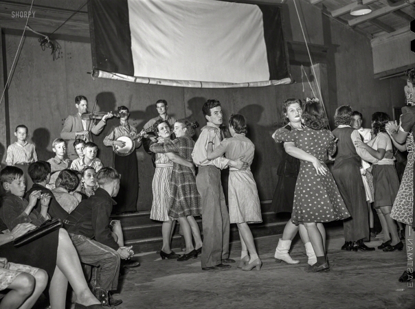Photo showing: Swing Your Partner -- February 1942. Farm Security Administration camp in Weslaco, Texas. Drake family playing for a Saturday night dance.
