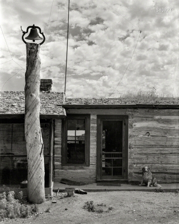 Photo showing: Bell, Bark and Saddle -- June 1939. Entrance to mess hall. Quarter Circle U Ranch, Big Horn County, Montana.