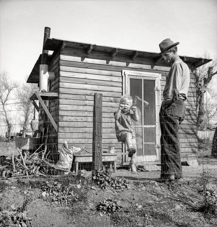 Photo showing: No Future Here -- February 1939. Madera County, California. Family from near Dallas, Texas. Rent is $5 a month. There's no future here.