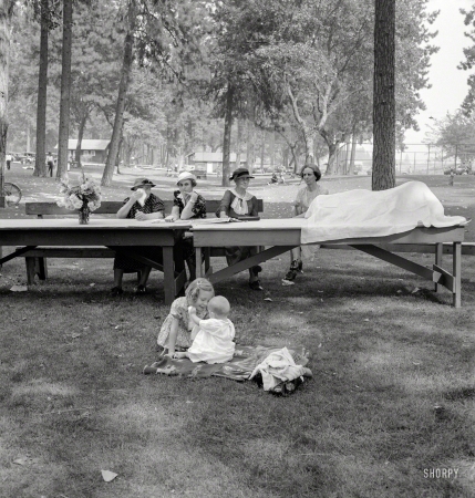 Photo showing: The Picnickers -- August 1939. Grants Pass, Oregon. 'California Day.' A picnic in town park on the Rogue River.