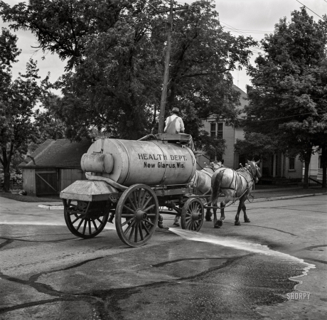 Photo showing: Street Spritz -- July 1937. Water wagon. New Glarus, Wisconsin.