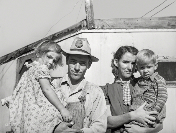 Photo showing: Chips off the Block -- December 1940. Family of carpenter's helper who live in a trailer. Corpus Christi, Texas.