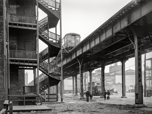 Photo showing: Playtime Under the El -- April 1941. Children playing under the elevated on the southside of Chicago.