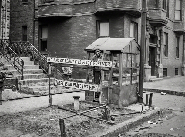 Photo showing: Ripe Two Mottoes -- April 1941. Candy stand run by Negro, Southside Chicago.