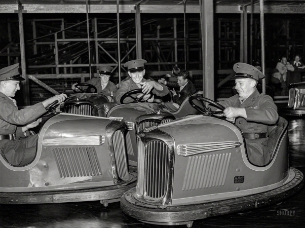 Photo showing: War Games. -- May 1941. Marines riding the electric automobiles at Mission Beach amusement center, San Diego.