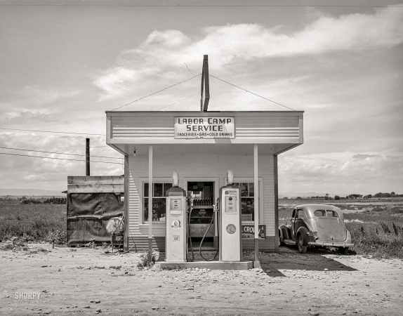 Photo showing: Idaho Chief -- June 1941. Filling station and store across the street from the FSA labor camp. Caldwell, Idaho.
