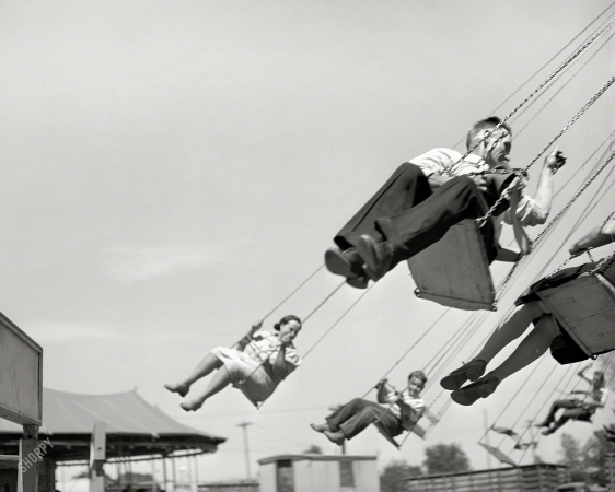 Photo showing: Centrifugal Fourth -- July 1941. Ride at the carnival which was part of the Fourth of July celebration at Vale, Oregon.