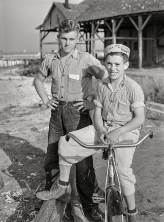 Photo showing: Pale Rider -- May 1940. Two boys, sons of fishermen. Deal Island, Maryland.