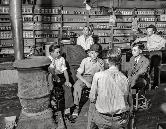 Photo showing: Sartorially Correct -- May 25, 1940. Interior of general store at Stem, Granville County,
North Carolina, with high school boys dressed up because it's Election Day.