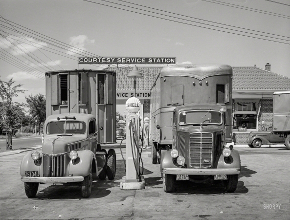 Photo showing: Courtesy Service -- June 1940. Trucks in service station on Bladensburg Road, Washington, D.C., U.S. Route 1.
