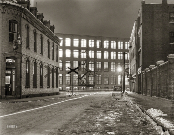 Photo showing: Light Industry -- January 1941. Textile mill working all night in Lowell, Massachusetts.