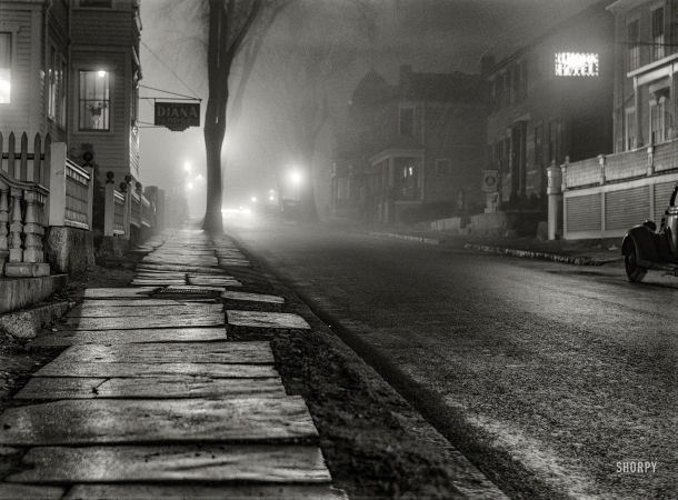Photo showing: Night and Fog -- January 1941. New Bedford, Massachusetts. Street at night during a fog.