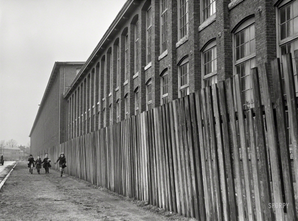 Photo showing: Career Girls -- January 1941. Outside a large textile mill in New Bedford, Massachusetts.