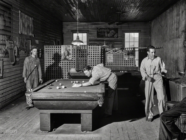 Photo showing: The Corner Pocket -- April 1941. Franklin, Heard County, Georgia. A game of pool in the general store.