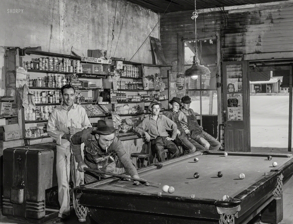 Photo showing: Community Pool -- April 1941. A game of pool in the general store. Franklin, Heard County, Georgia.