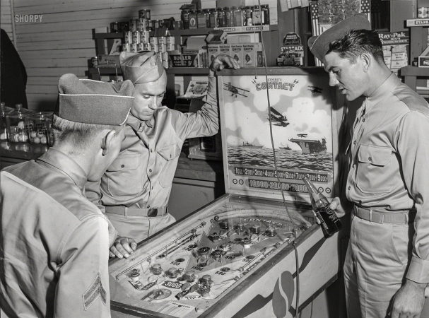 Photo showing: Call of Duty 1.0 -- May 1941. Soldiers from Fort Benning in a country store near Phenix City, Alabama.