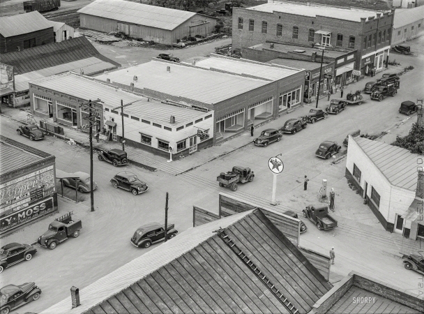 Photo showing: Local Traffic. -- May 1941. Intersection of the two main streets of Childersburg, Alabama.