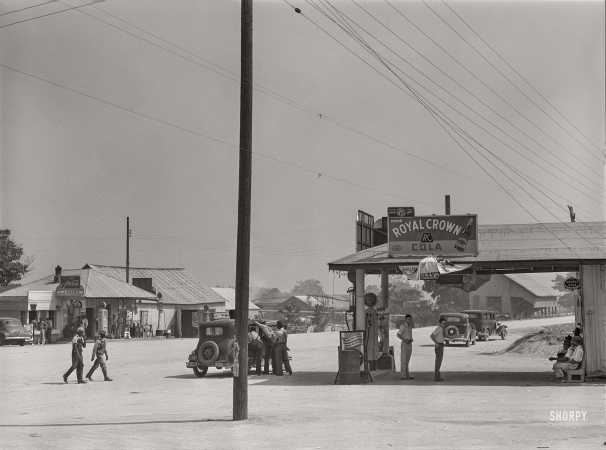 Photo showing: Welcome to Woodville -- June 1941. The center of Woodville. Greene County, Georgia.