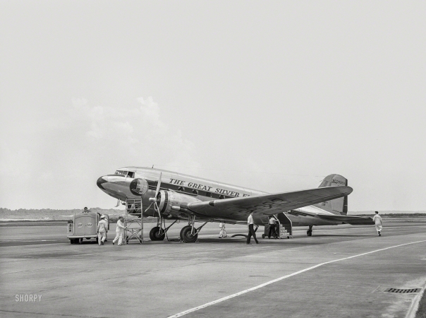 Photo showing: Onward and Upward! -- July 1941. An airliner being readied for a takeoff. Municipal airport, Washington, D.C.
