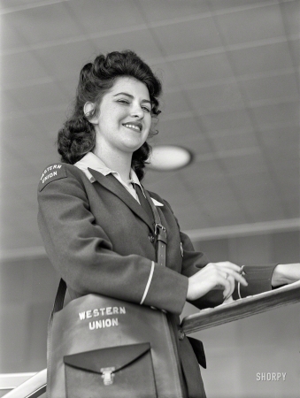 Photo showing: Text Messenger -- July 1941. A Western Union girl. Washington, D.C., municipal airport.