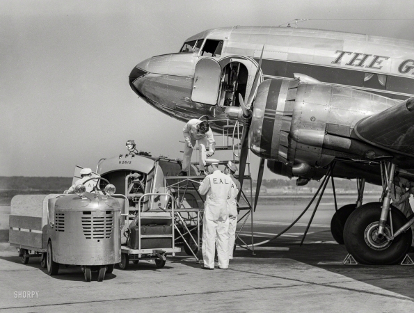 Photo showing: Eastern Air Lines -- July 1941. An airliner taking on baggage and fuel. Washington, D.C., municipal (National) airport.