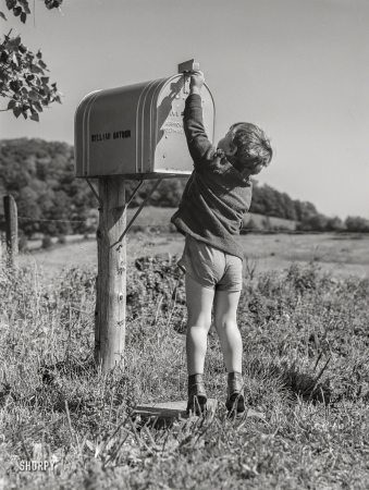 Photo showing: Weve Got Mail -- August 1941. Dicky Gaynor, son of FSA dairy farmer near Fairfield, Vermont.