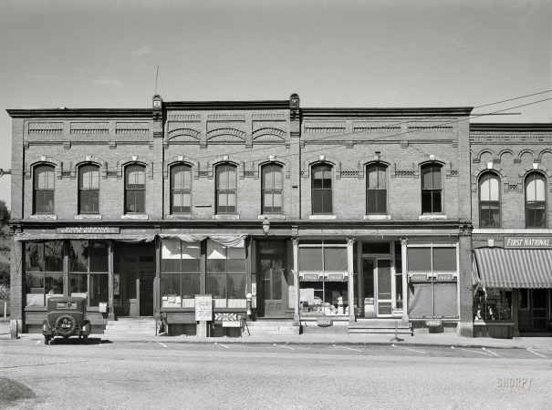 Photo showing: South Royalton -- September 1941. Small-town scenes in Vermont. Storefronts along the main street in South Royalton.