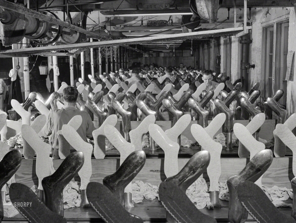 Photo showing: Socks Workers -- November 1941. Sock driers at the hosiery mill in Greene County, Georgia.