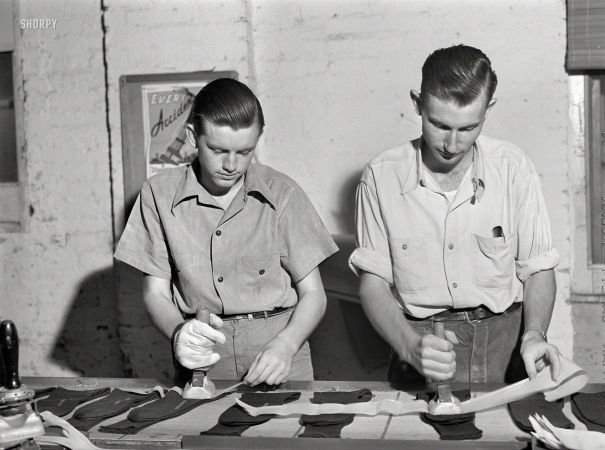 Photo showing: Socks Partners -- November 1941. In the Union Point Manufacturing Co. hosiery mill, Greene County, Georgia.