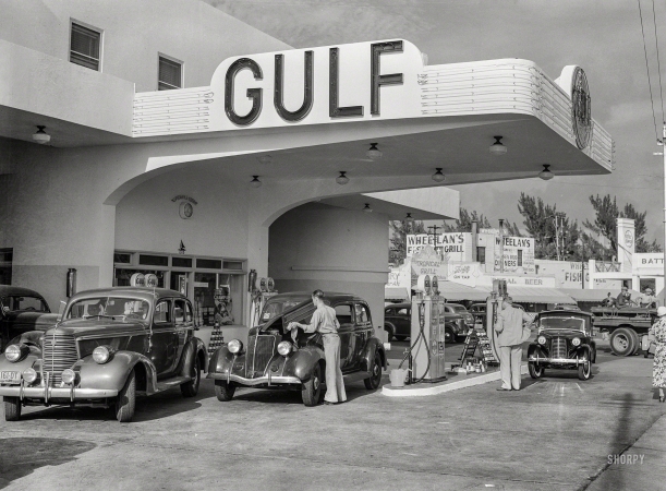 Photo showing: Gulf Service. -- April 1939. Miami Beach, Florida. Even the gas stations are on an elaborate scale, often modern in design, resembling hotels.