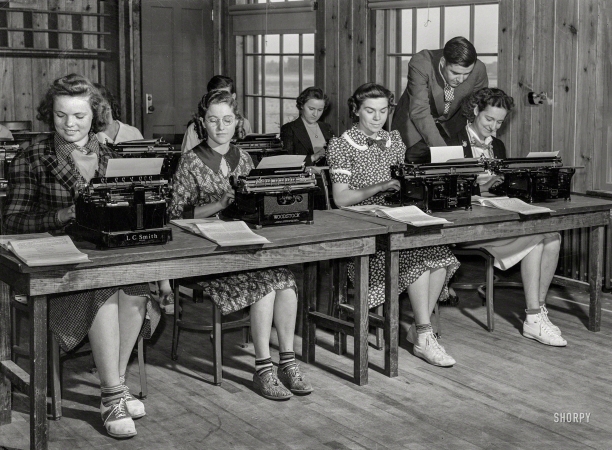 Photo showing: The Typing Pool. -- May 1939. School students in typing class. Ashwood Plantations, South Carolina.