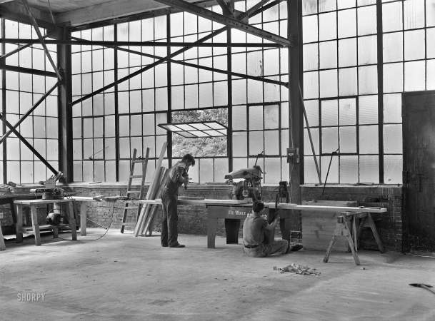 Photo showing: I Saw What You Did -- May-June 1939. Atlanta, Georgia. Woodworking shop at FSA warehouse depot.