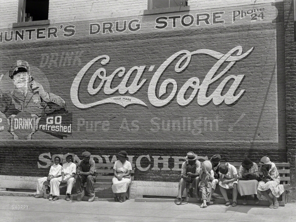 Photo showing: Pure as Sunlight -- Spring 1939. Street scene along the main thoroughfare in Greensboro, Georgia.