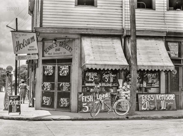 Photo showing: Eggs Kerosene -- June 1939. Savannah, Georgia. Negro grocery store.