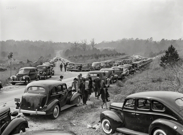 Photo showing: Game Day. -- November 1939. Durham County, North Carolina. Cars parked along the
highways on day of Duke-Carolina football game, near Duke University Stadium.