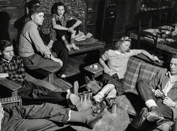 Photo showing: The Smart Set -- March 1940. Skiers from Boston relaxing in lodge at North Conway, New Hampshire.