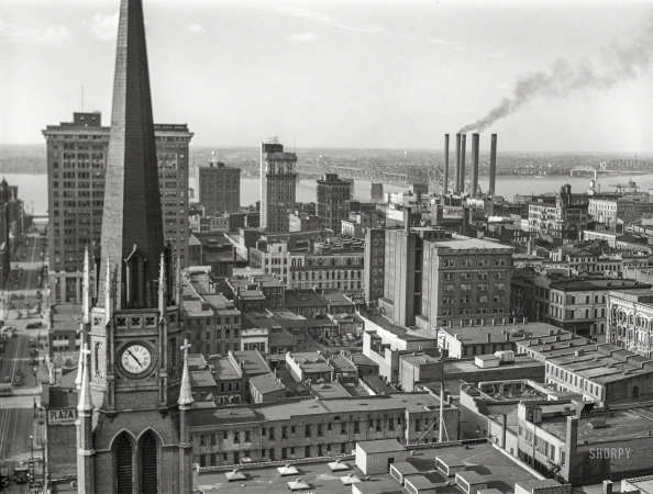 Photo showing: Steeples-n-Stacks -- May 1940. Downtown Louisville, Kentucky; Ohio River in background.