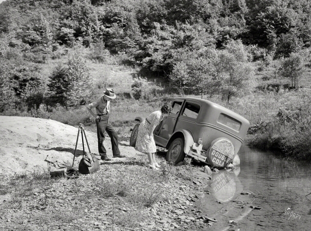 Photo showing: Double Trouble -- September 1940. Breathitt County, Kentucky. Car in which school superintendent and
photographer went up South Fork of the Kentucky River to take pictures of rural schools.