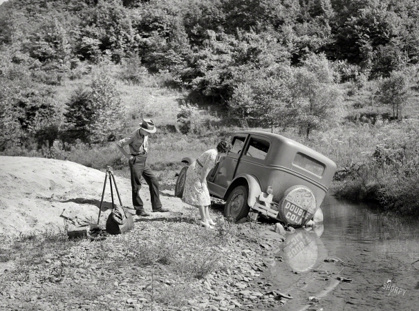 Photo showing: Double Trouble -- September 1940. Breathitt County, Kentucky. Car in which school superintendent and
photographer went up South Fork of the Kentucky River to take pictures of rural schools.