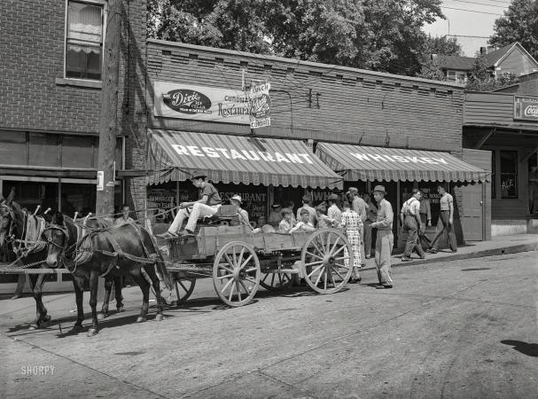 Photo showing: Dixie Whiskey -- September 1940. Selling watermelons on Saturdays and court day in Jackson. Breathitt County, Kentucky.