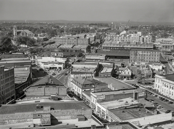 Photo showing: Five Points -- October 1940. Durham, North Carolina. Five Points, center of city, with Chesterfield cigarette factories in background.