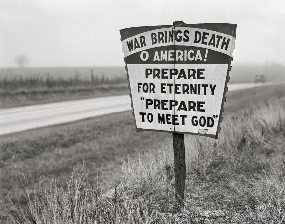 Photo showing: O America! -- December 1940. Religious sign on highway between Columbus and
Augusta, Georgia. This sign was painted red, white and blue.