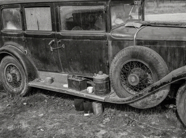 Photo showing: Broken In -- December 1940. Close-up of car from Mississippi used for sleeping as well
as shelter and traveling.On highway near Camp Livingston. Alexandria, Louisiana.