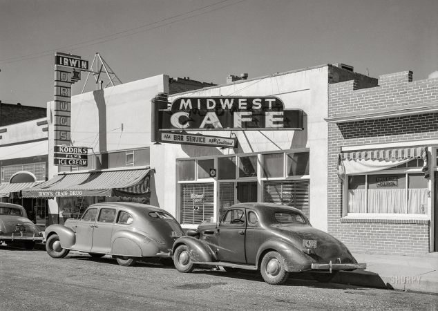 Photo showing: Midwest Cafe -- September 1941. Main street of Craig, Colorado. A new and thriving boom town.