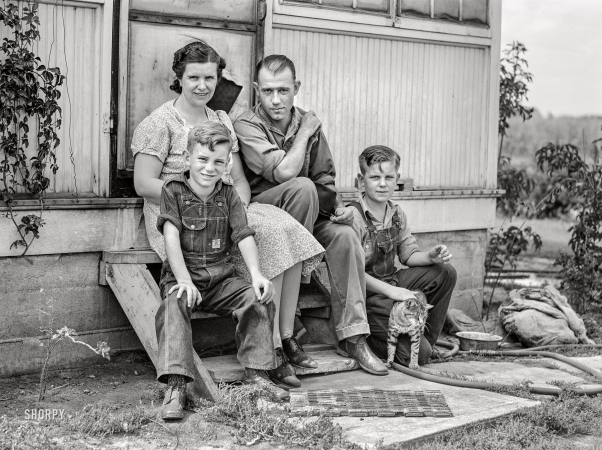 Photo showing: Meet the Renningers -- September 1941. Mr. and Mrs. Harvey Renninger with sons Richard and Winfield,
members of the Two River Non-Stock Cooperative. Waterloo, Nebraska.
