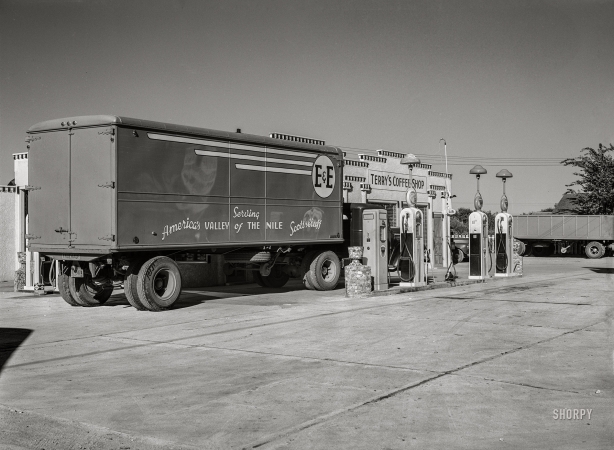 Photo showing: Terrys Coffee Shop -- September 1941. Transport truck in service station. Scottsbluff, Nebraska.