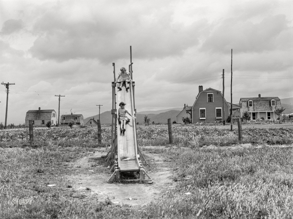 Photo showing: Tygart Sliders -- June 1939. Tygart Valley Homesteads, near Elkins, West Virginia. Children at play.