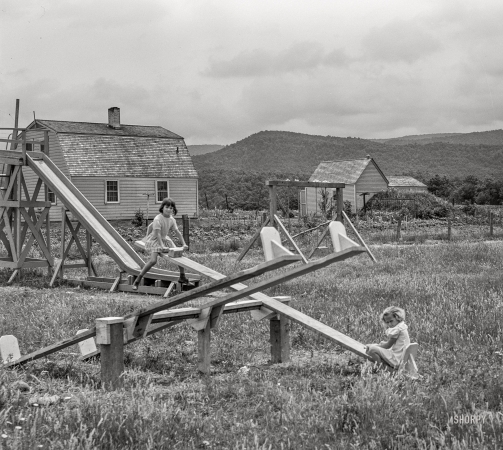 Photo showing: Teeter Tots -- June 1939. Children playing -- Tygart Valley Homesteads, West Virginia.